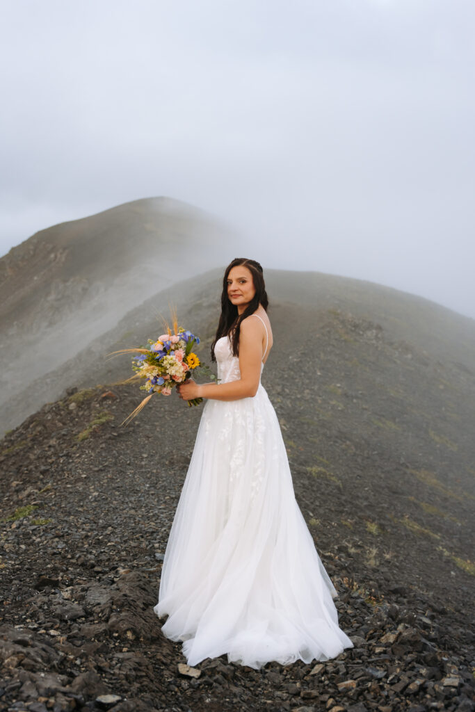 Rocky Mountain bride with wildflower bouquet